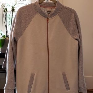 White jacket with rose gold zipper